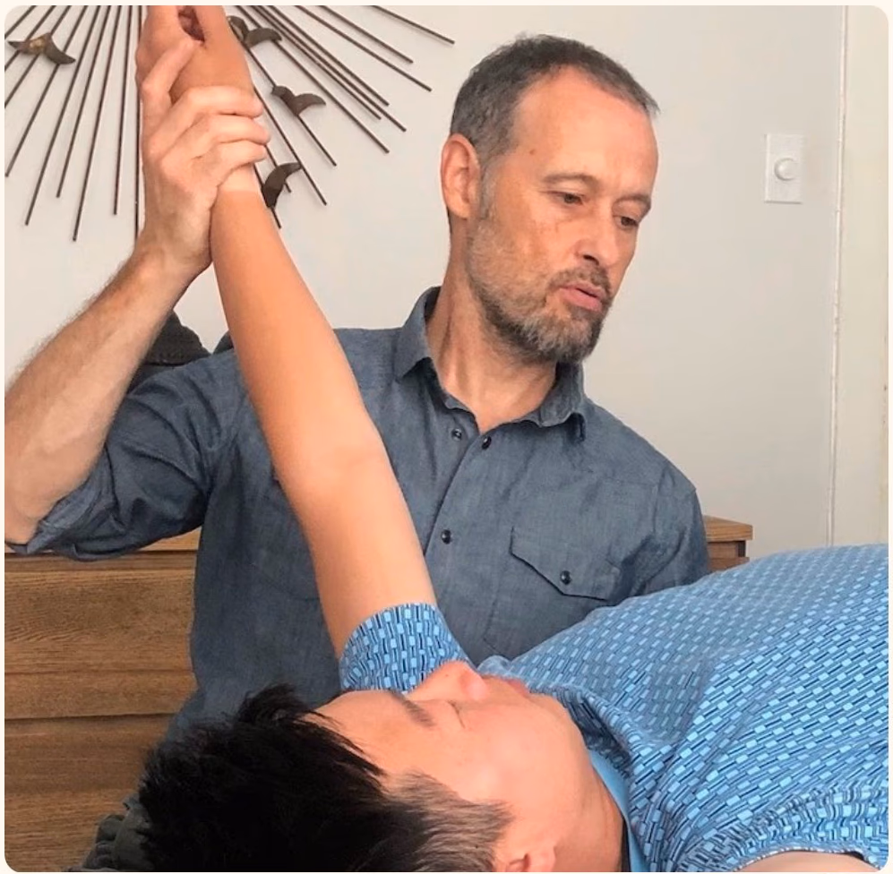 Dr. Garrett working with patient